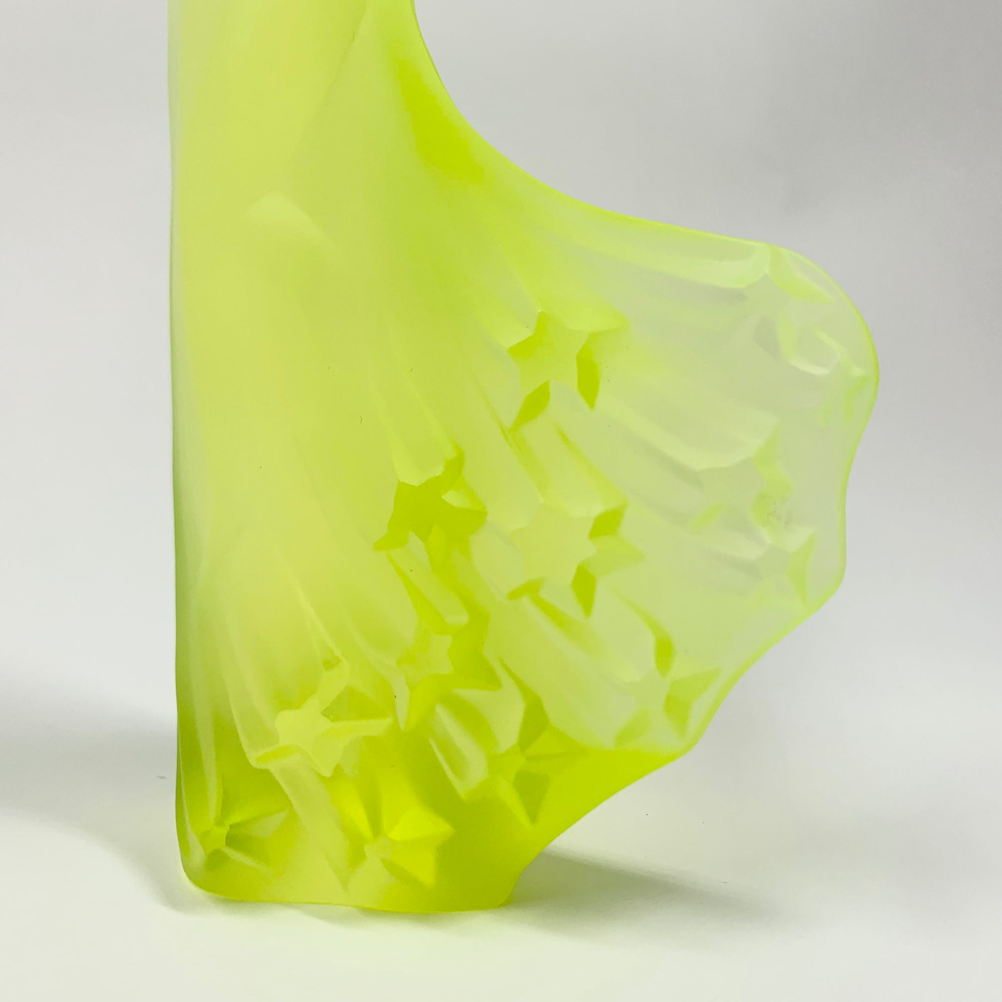Art Deco reproduction of Lalique Nude with star bangle cape figurine in uranium glass