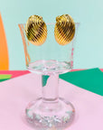 Rare 1970s triple gold plated ribbed cocoon clip on earrings by Monet