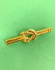 1970s French plated knot ribbon brooch