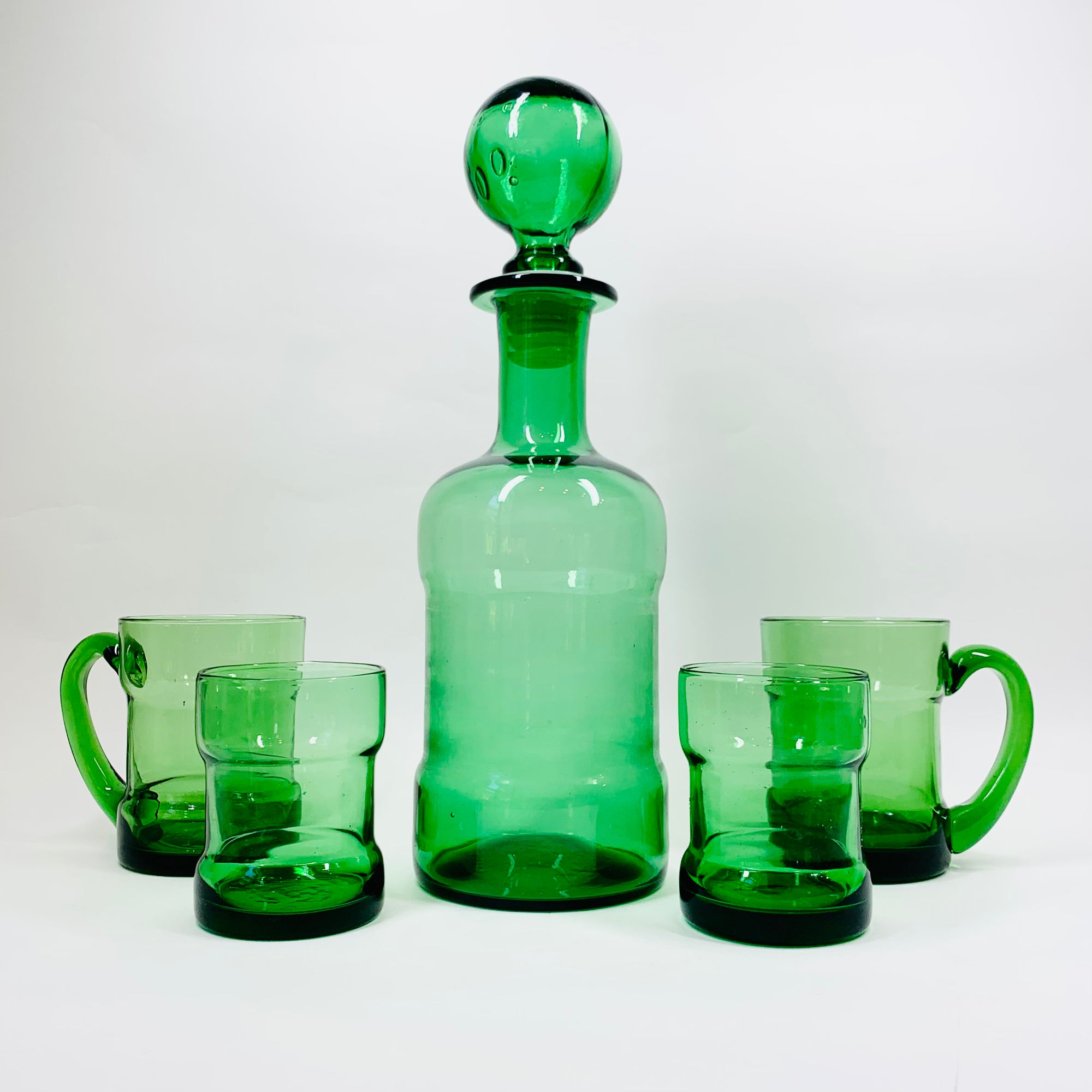 Rare Midcentury Italian green glass set with detachable leather sleeves