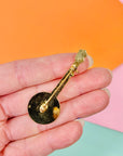 Rare 1950s gold plated banjo brooch with rhinestone