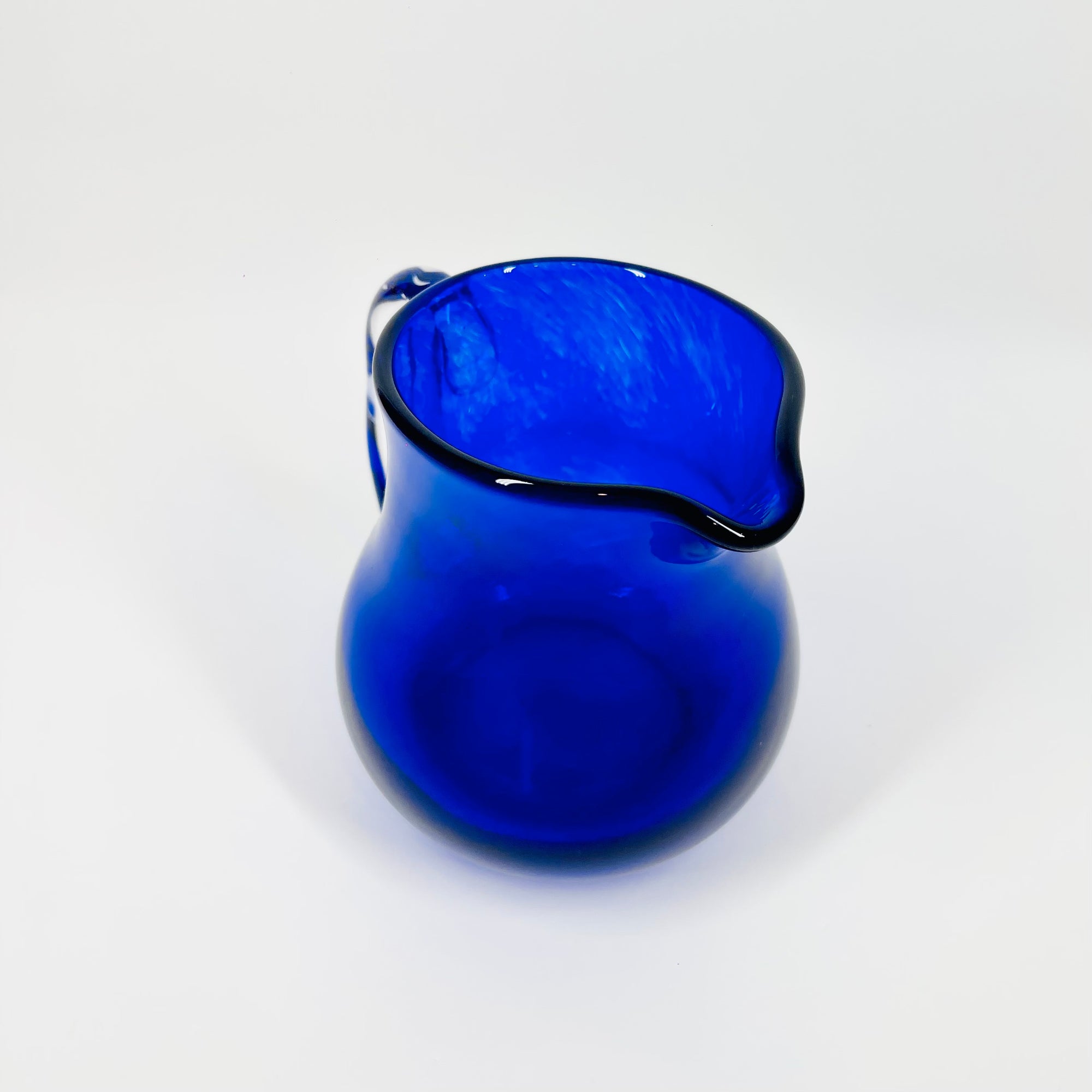 1980s MOUTH BLOWN COBALT BLUE SPATTER GLASS JUG