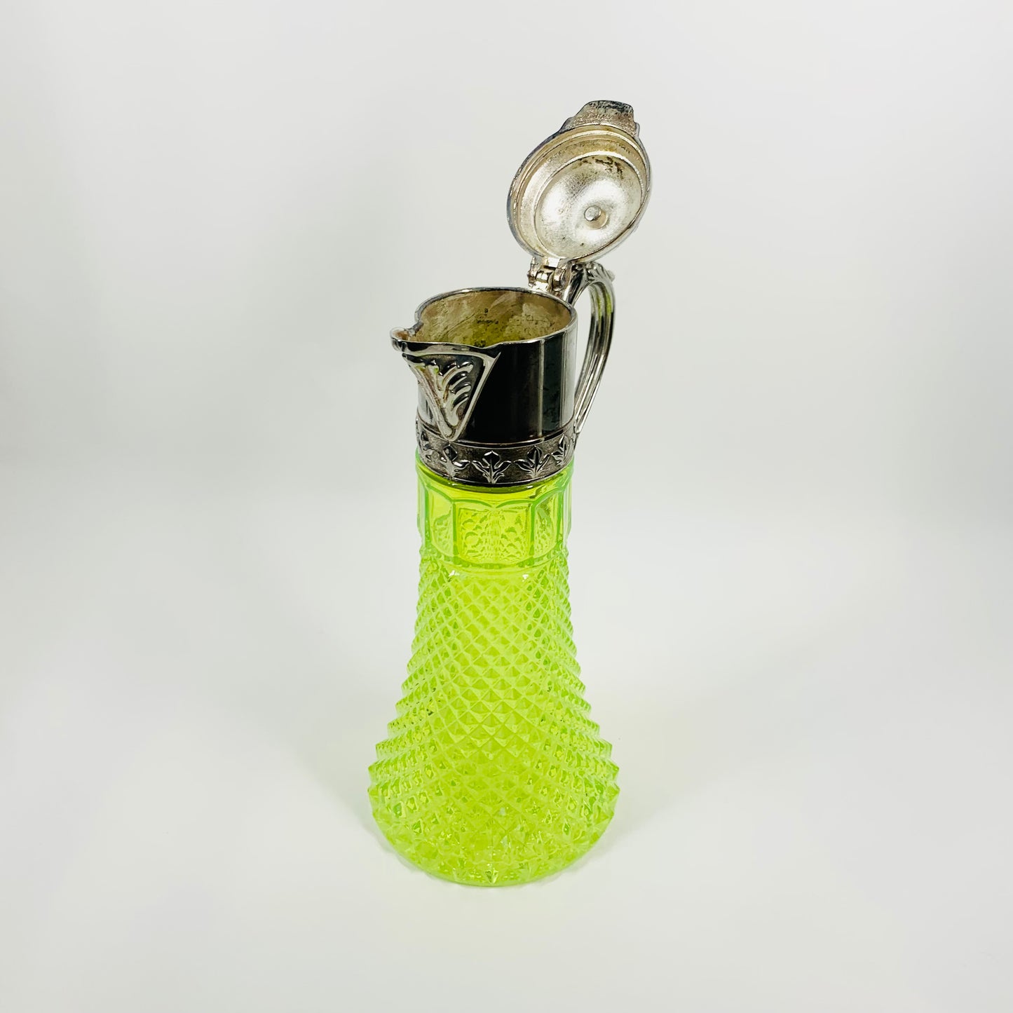 ANTIQUE URANIUM GLASS CLARET JUG WITH SILVER FITTINGS