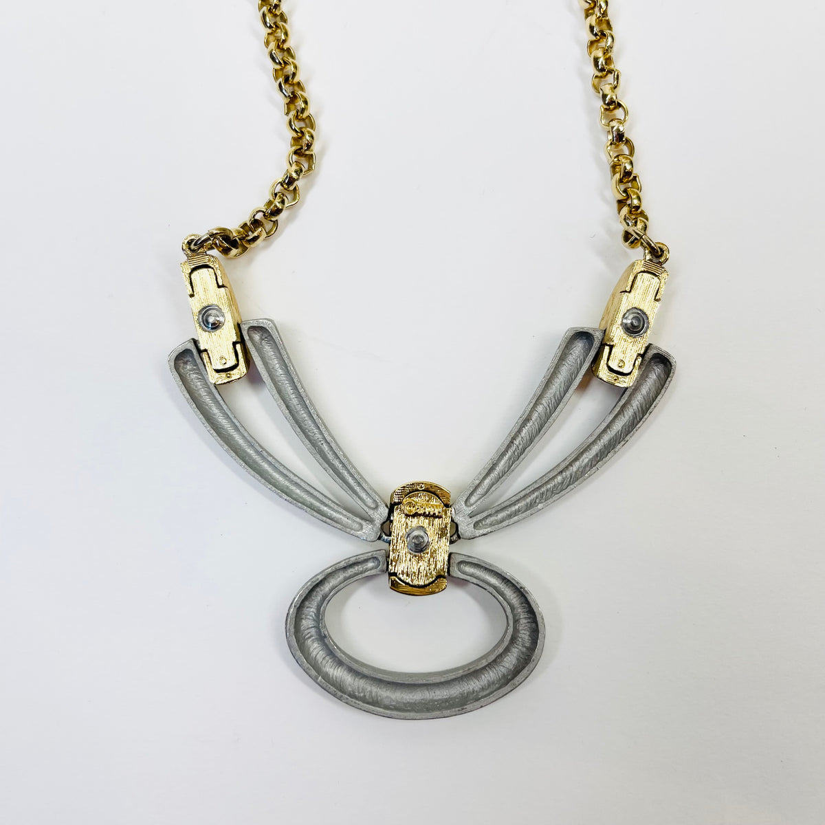 1960s BRUTALIST NECKLACE WITH STAINLESS STEEL BOW PENDANT