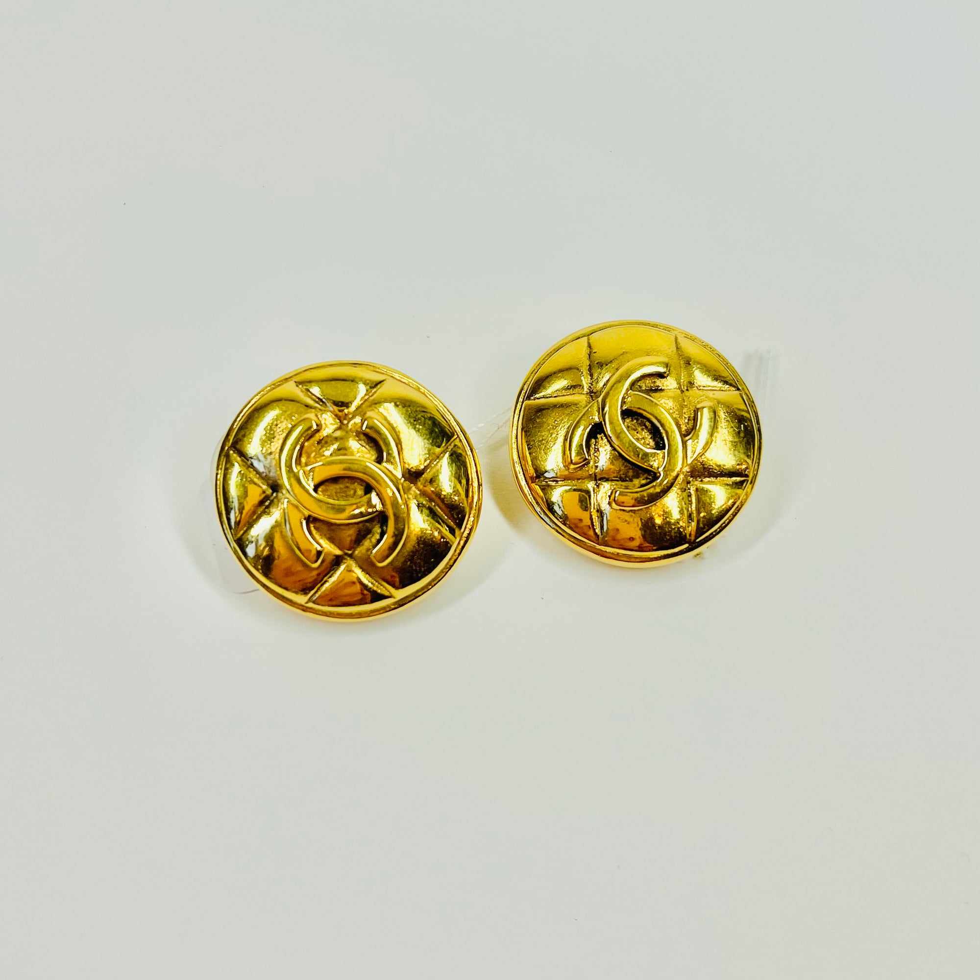 1980s CHANEL QUILTED GOLD LOGO BUTTON CLIP ON EARRINGS