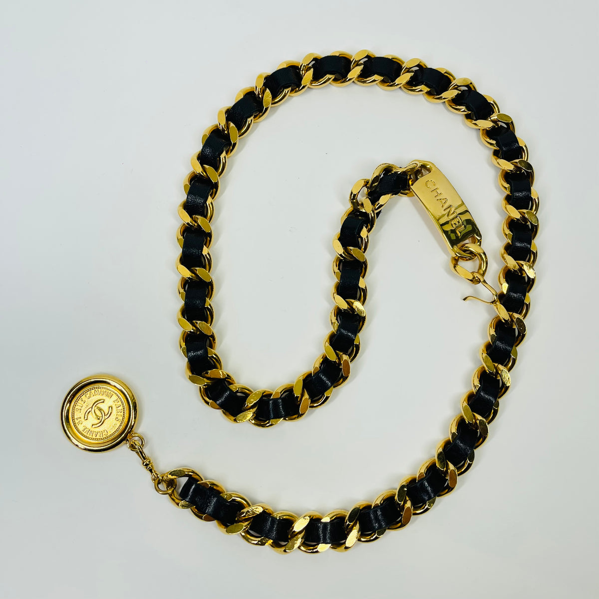 1980s CHANEL BLACK LEATHER GOLD PLATED LOGO BELT