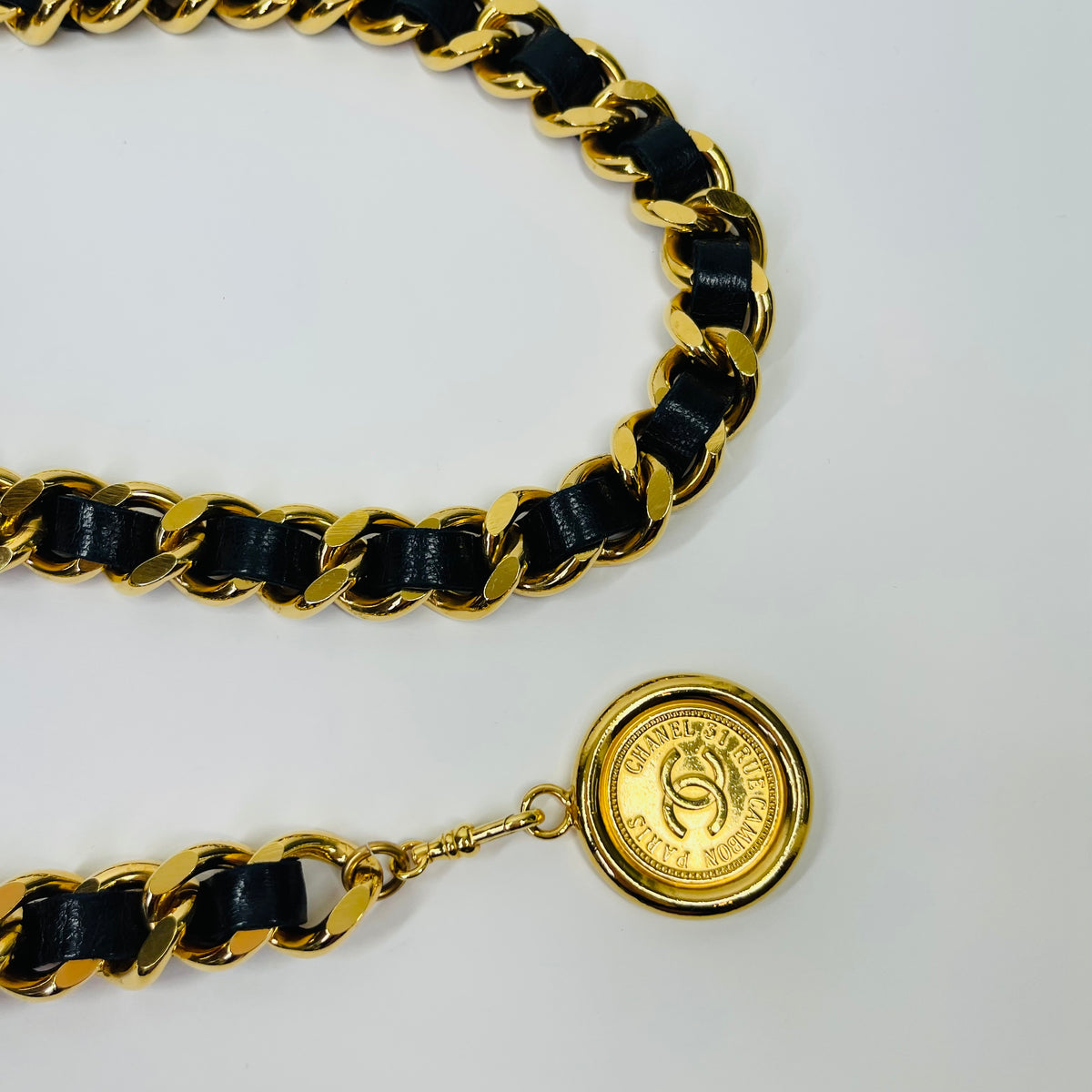 1980s CHANEL BLACK LEATHER GOLD PLATED LOGO BELT