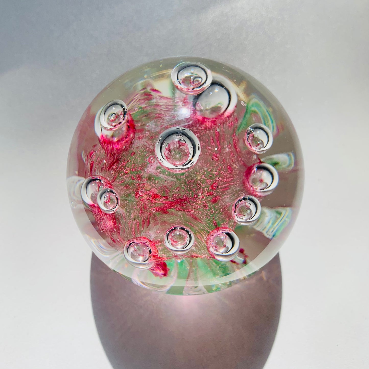 PINK GREEN SPACE PAPERWEIGHT