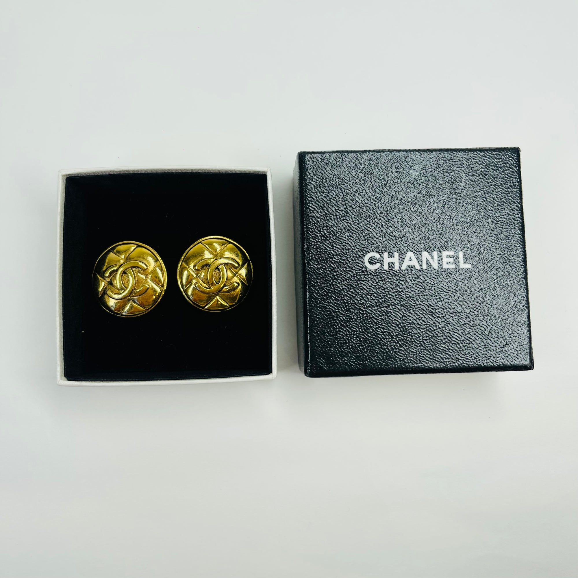 1980s CHANEL QUILTED GOLD LOGO BUTTON CLIP ON EARRINGS
