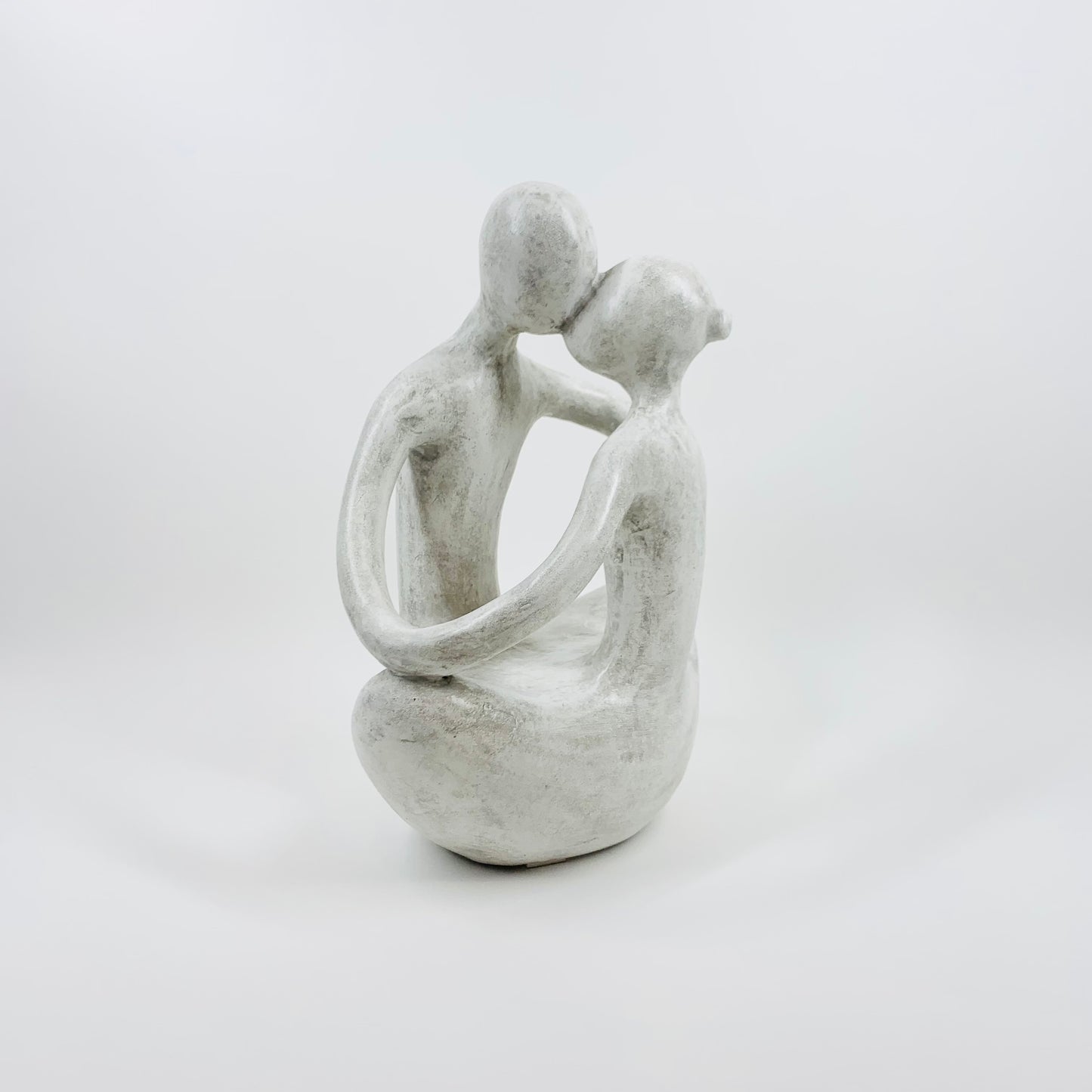 1980s COMPOSITE STONE EMBRACING COUPLE SCULPTURE