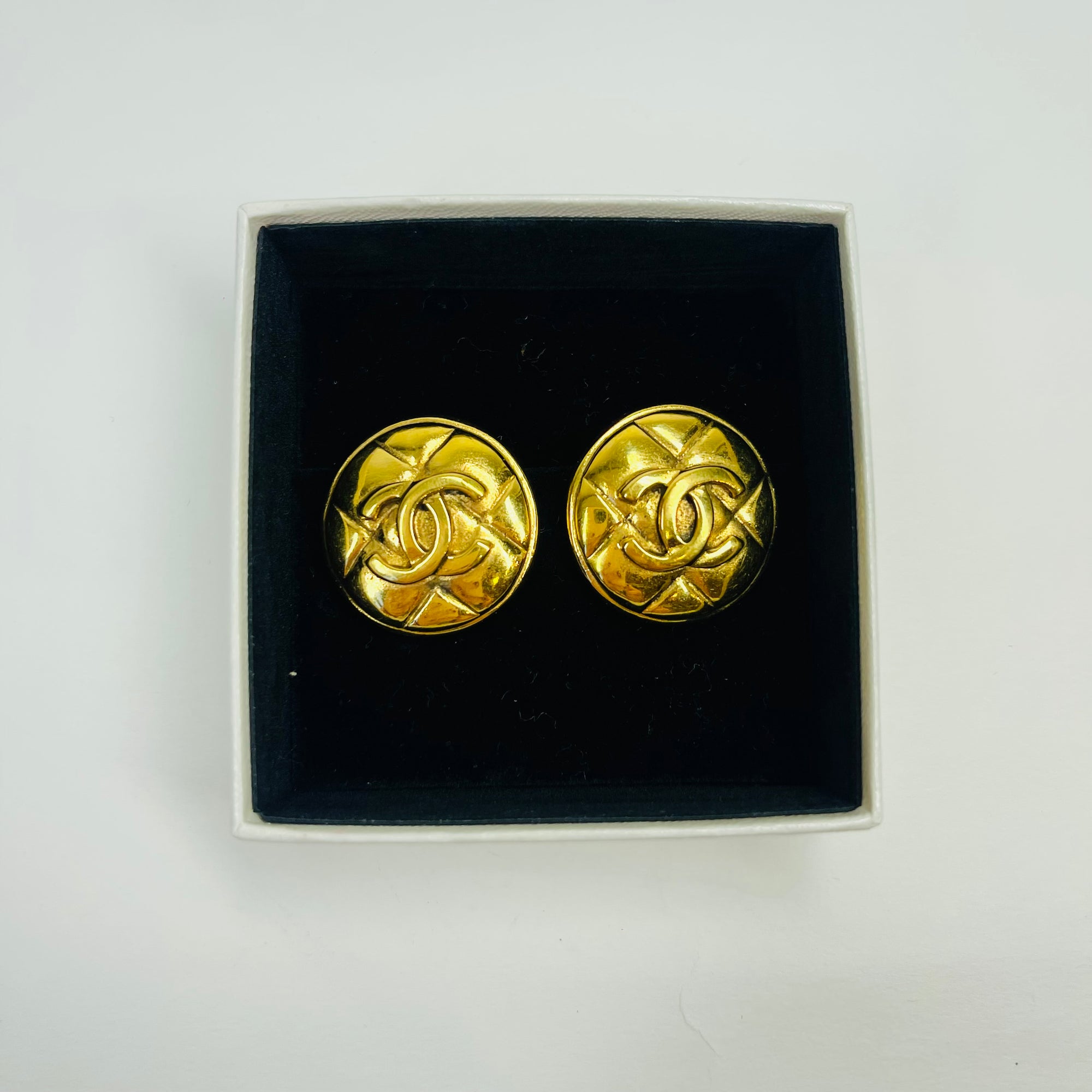 1980s CHANEL QUILTED GOLD LOGO BUTTON CLIP ON EARRINGS