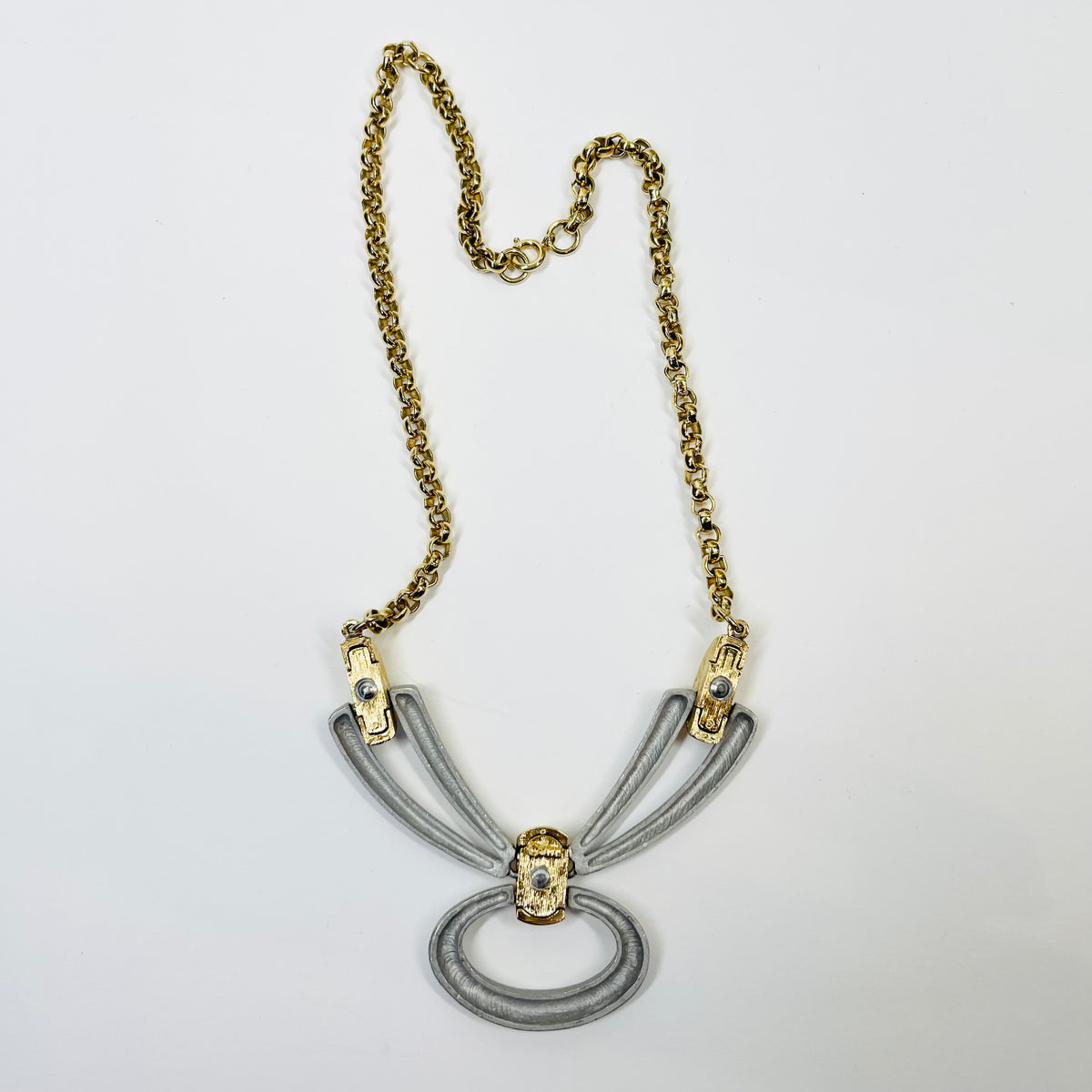 1960s BRUTALIST NECKLACE WITH STAINLESS STEEL BOW PENDANT