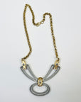 1960s BRUTALIST NECKLACE WITH STAINLESS STEEL BOW PENDANT