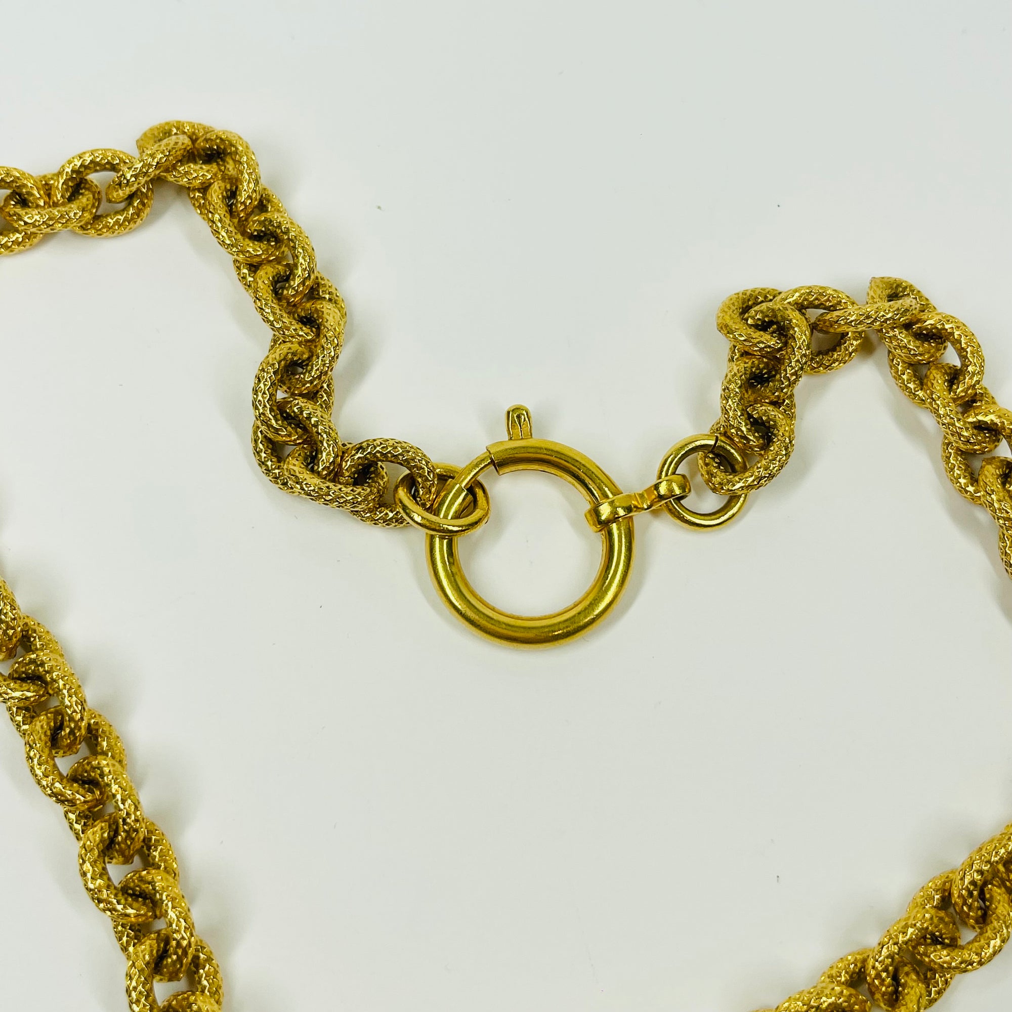 LIMITED EDITION 1980s CHANEL FILIGREE LOGO PENDANT NECKLACE WITH FANCY TEXTURED LINKS