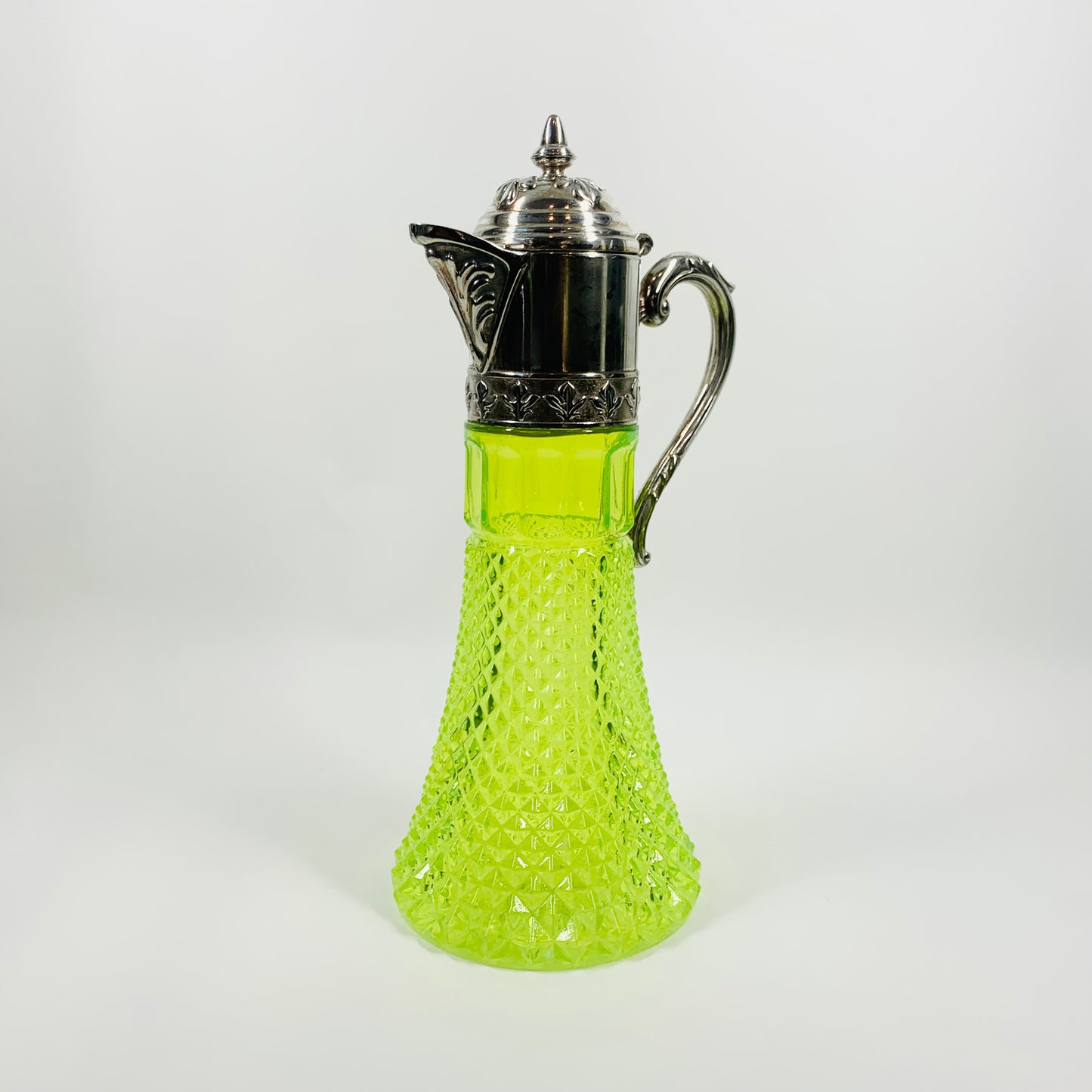 ANTIQUE URANIUM GLASS CLARET JUG WITH SILVER FITTINGS