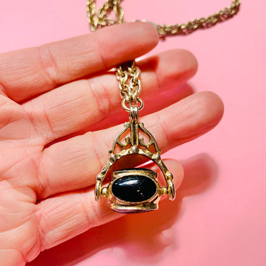 FOB SPINNER NECKLACE