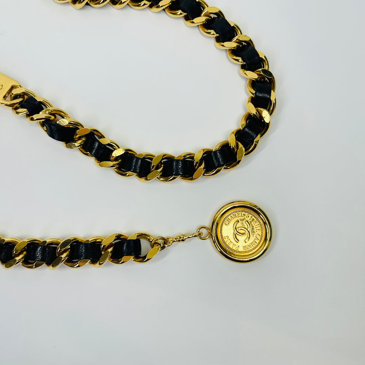 1980s CHANEL BLACK LEATHER GOLD PLATED LOGO BELT