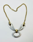 1960s BRUTALIST NECKLACE WITH STAINLESS STEEL BOW PENDANT