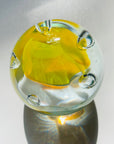 YELLOW SPACE AGE PAPERWEIGHT