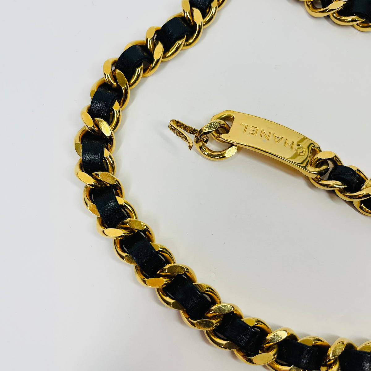 1980s CHANEL BLACK LEATHER GOLD PLATED LOGO BELT