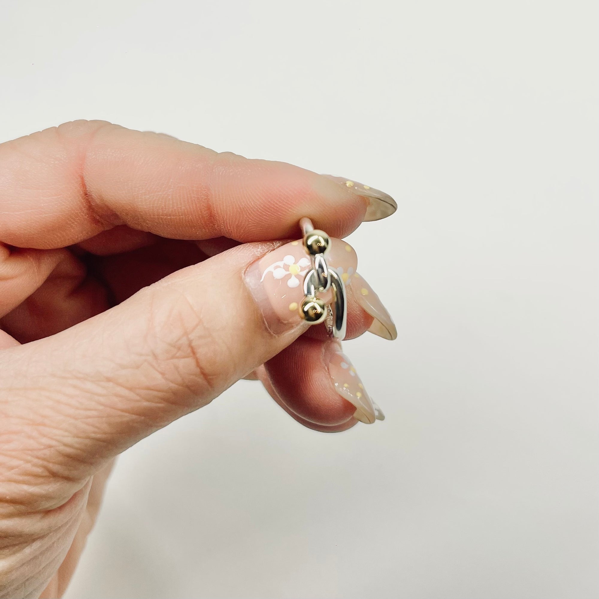 1990s VINTAGE TIFFANY &amp; CO SILVER GOLD HOOK EYE LOVE KNOT CIRCLE RING