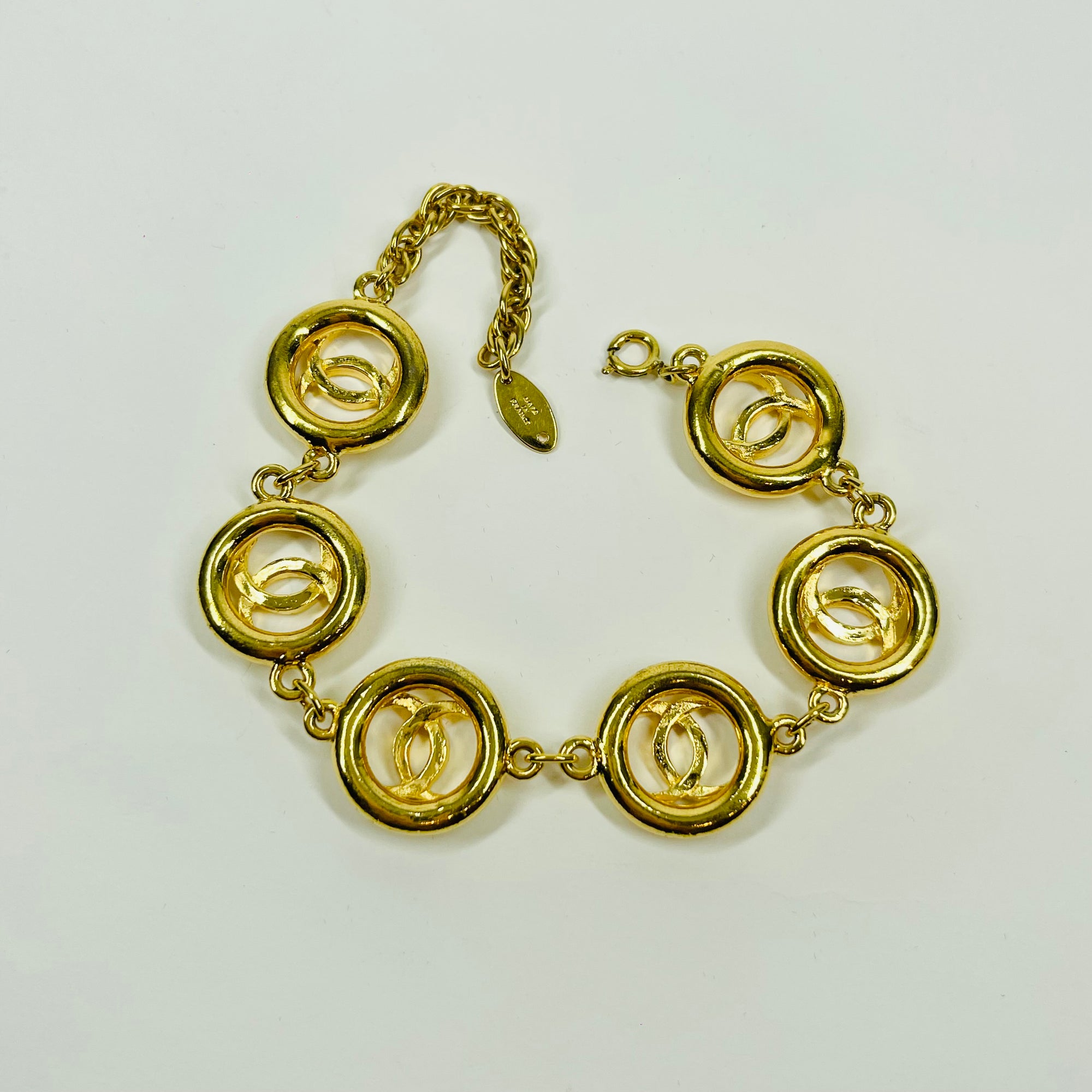 1982 CHANEL CC LOGO COIN LINKS BRACELET