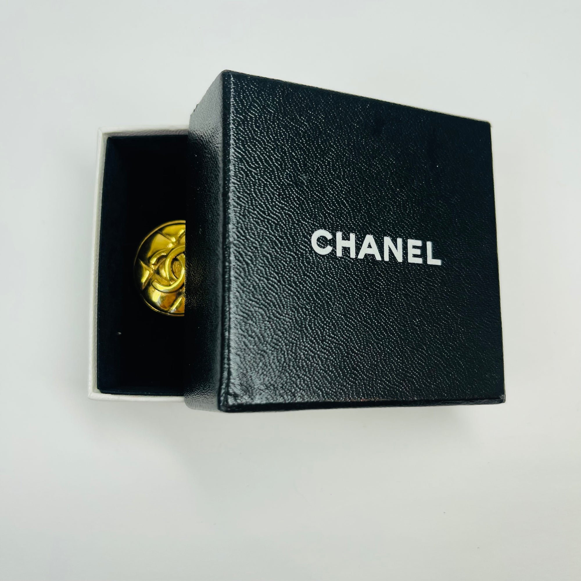 1980s CHANEL QUILTED GOLD LOGO BUTTON CLIP ON EARRINGS