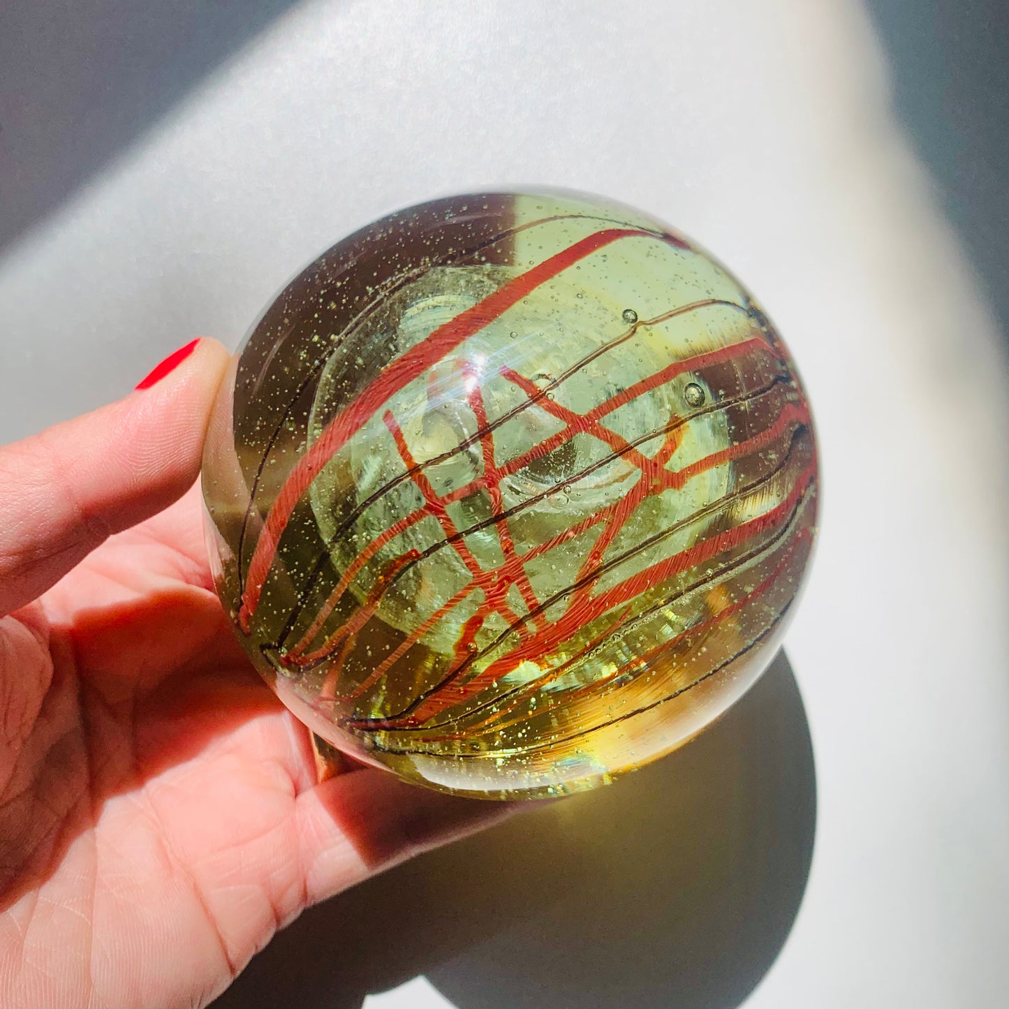 1980s ORANGE ABSTRACT LINES ART GLASS PAPERWEIGHT