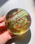 1980s ORANGE ABSTRACT LINES ART GLASS PAPERWEIGHT
