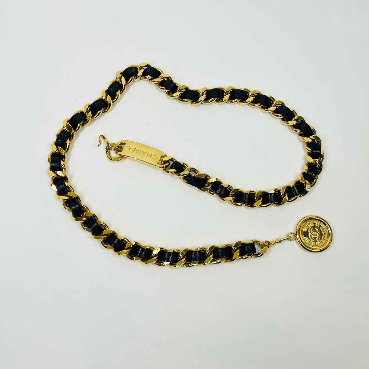 1980s CHANEL BLACK LEATHER GOLD PLATED LOGO BELT