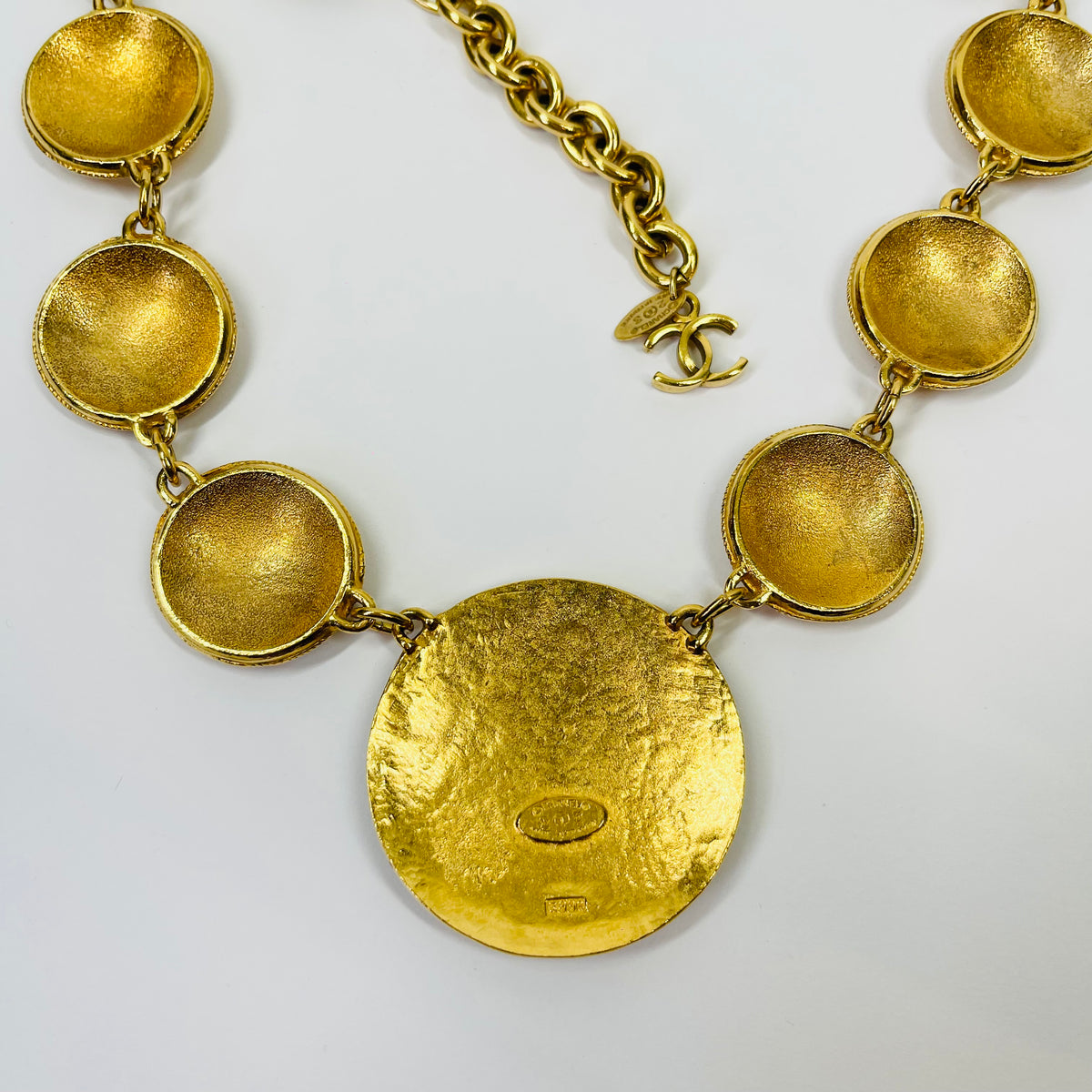 1980s CHANEL ESTRUCAN STYLE LOGO MEDALLION NECKLACE