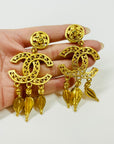 1980s CHANEL LARGE ARABESQUE TASSEL CC FILIGREE LOGO DROP CLIP ON EARRINGS