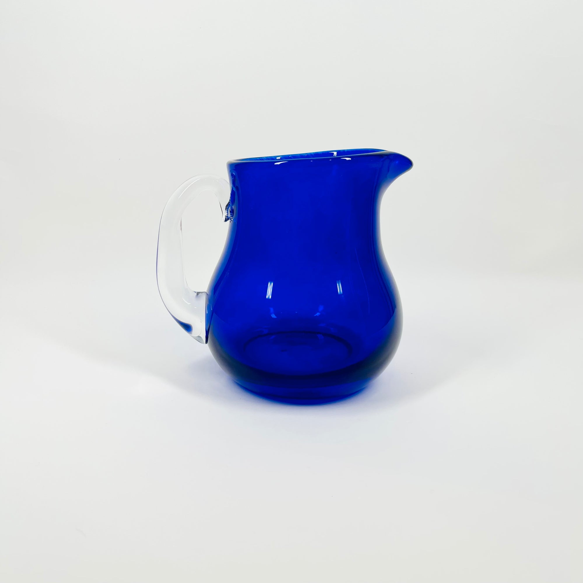 1980s MOUTH BLOWN COBALT BLUE SPATTER GLASS JUG