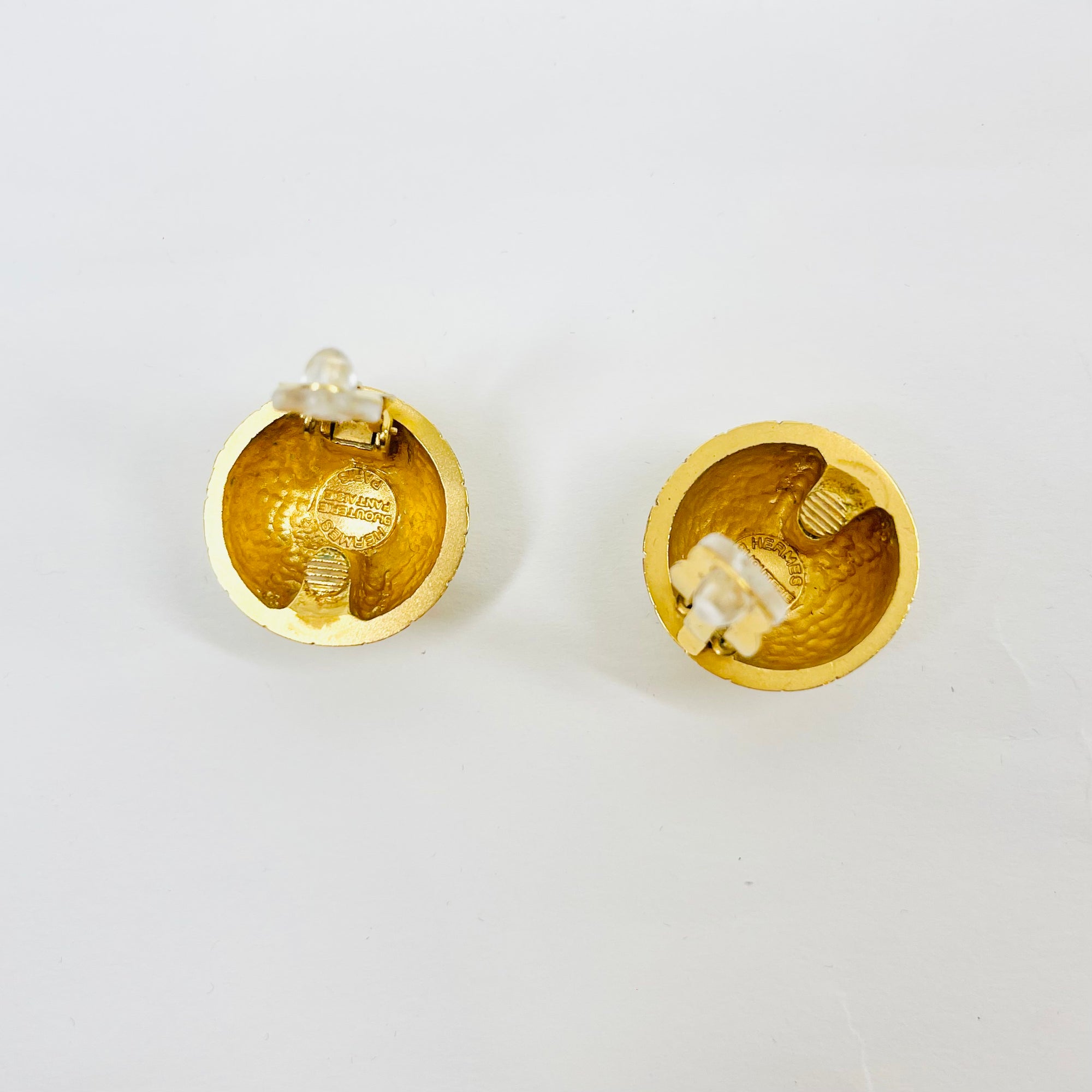 1980s HERMES ETCHED ATLAS BUTTON CLIP ON EARRINGS