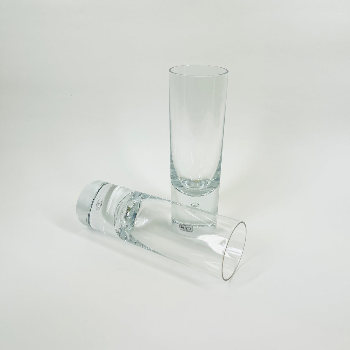 1960s KOSTA SWEDEN HIGHBALL GLASSES WITH PAPERWEIGHT BASE