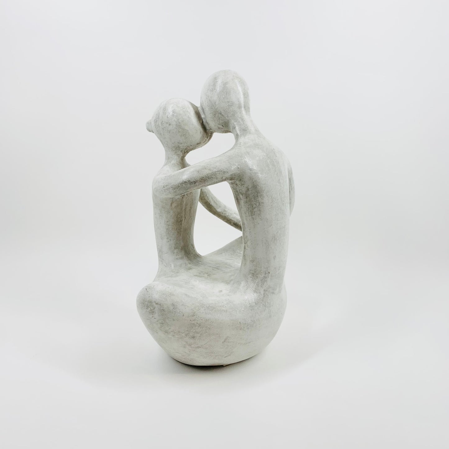 1980s COMPOSITE STONE EMBRACING COUPLE SCULPTURE