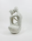 1980s COMPOSITE STONE EMBRACING COUPLE SCULPTURE
