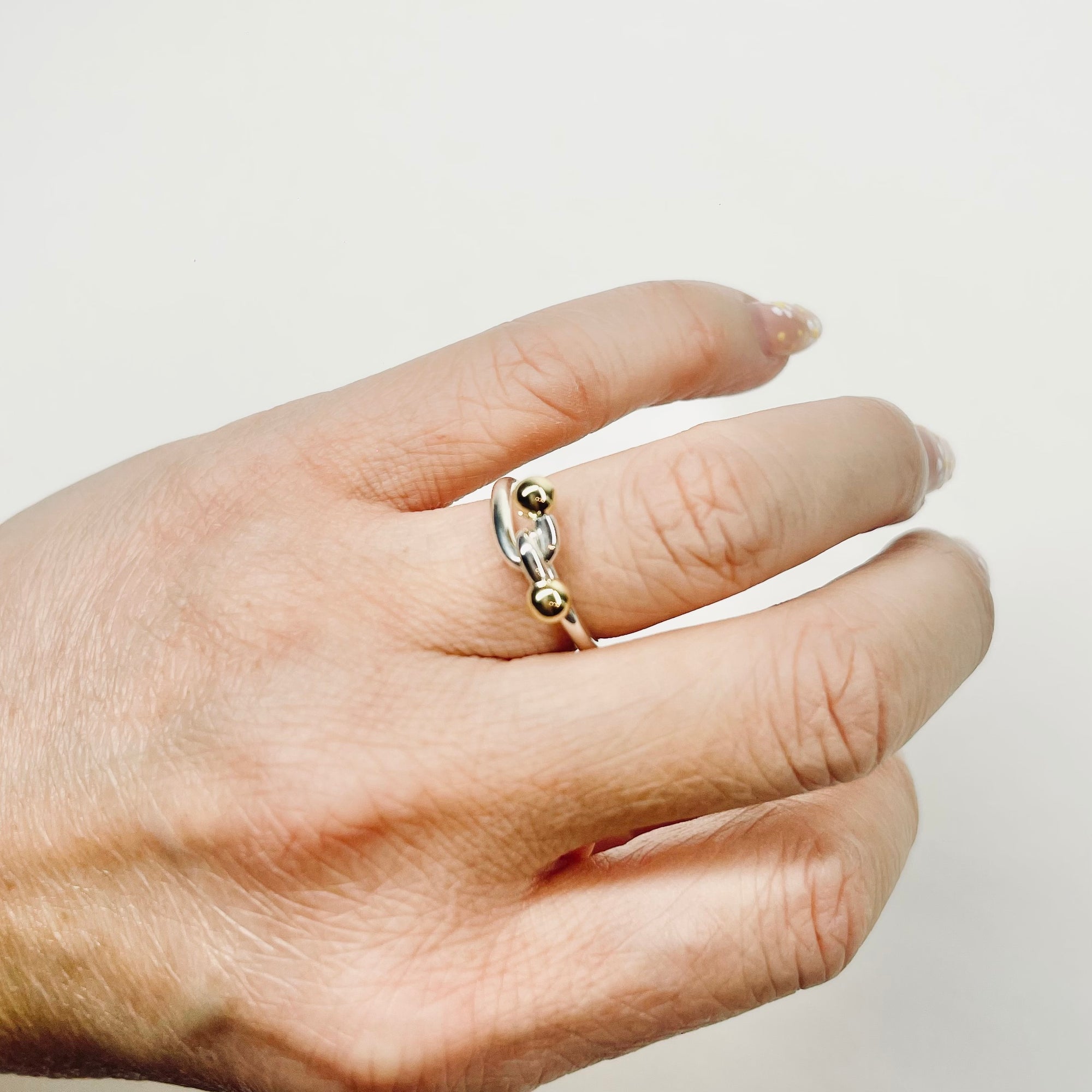 1990s VINTAGE TIFFANY &amp; CO SILVER GOLD HOOK EYE LOVE KNOT CIRCLE RING
