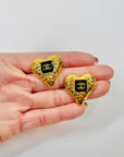 2023 LIMITED EDITION CHANEL CC BLACK ENAMEL TEXTURED LOGO HEARTS PIERCED EARRINGS