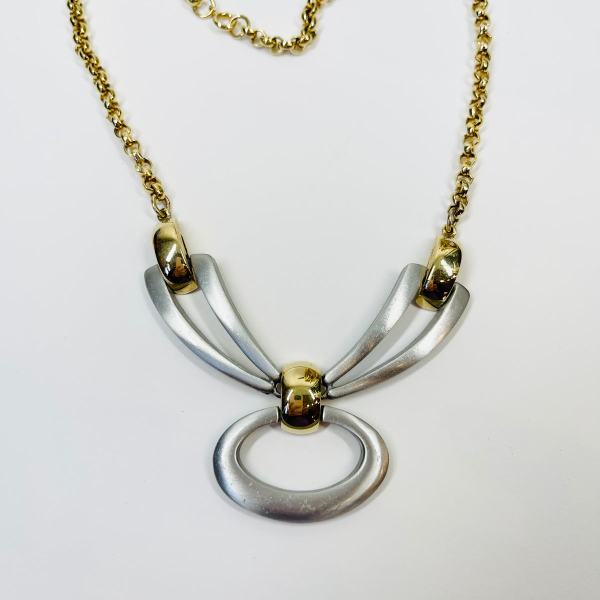 1960s BRUTALIST NECKLACE WITH STAINLESS STEEL BOW PENDANT