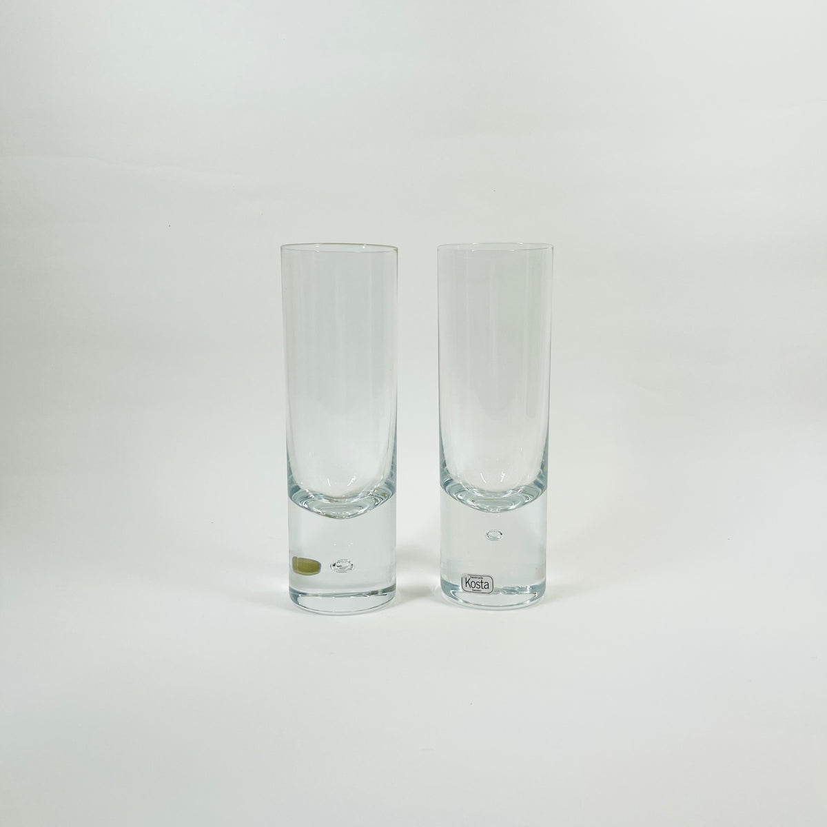 1960s KOSTA SWEDEN HIGHBALL GLASSES WITH PAPERWEIGHT BASE