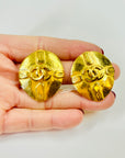 1980s CHANEL TEAR DROP GOLD LOGO CLIP ON EARRINGS