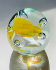 YELLOW SPACE AGE PAPERWEIGHT