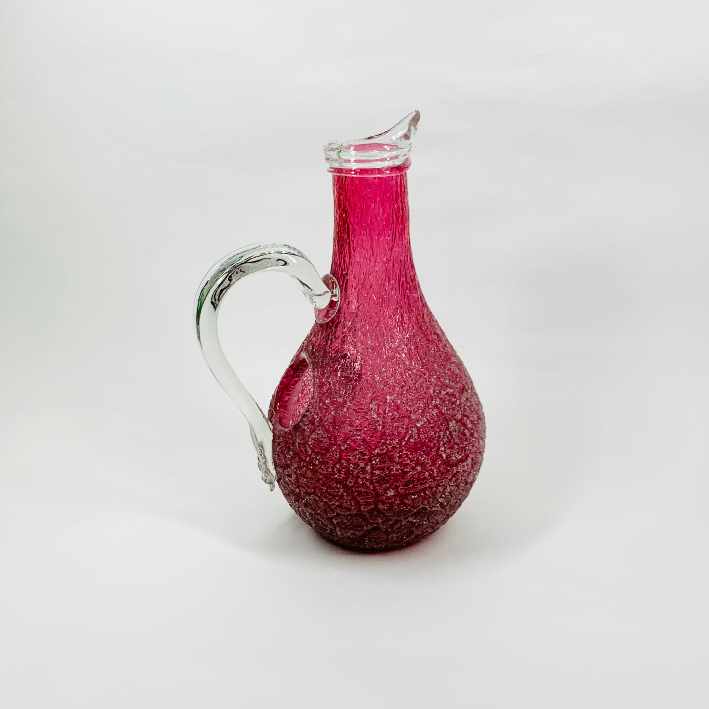 Antique Victorian cranberry crackle glass jug with clear handle