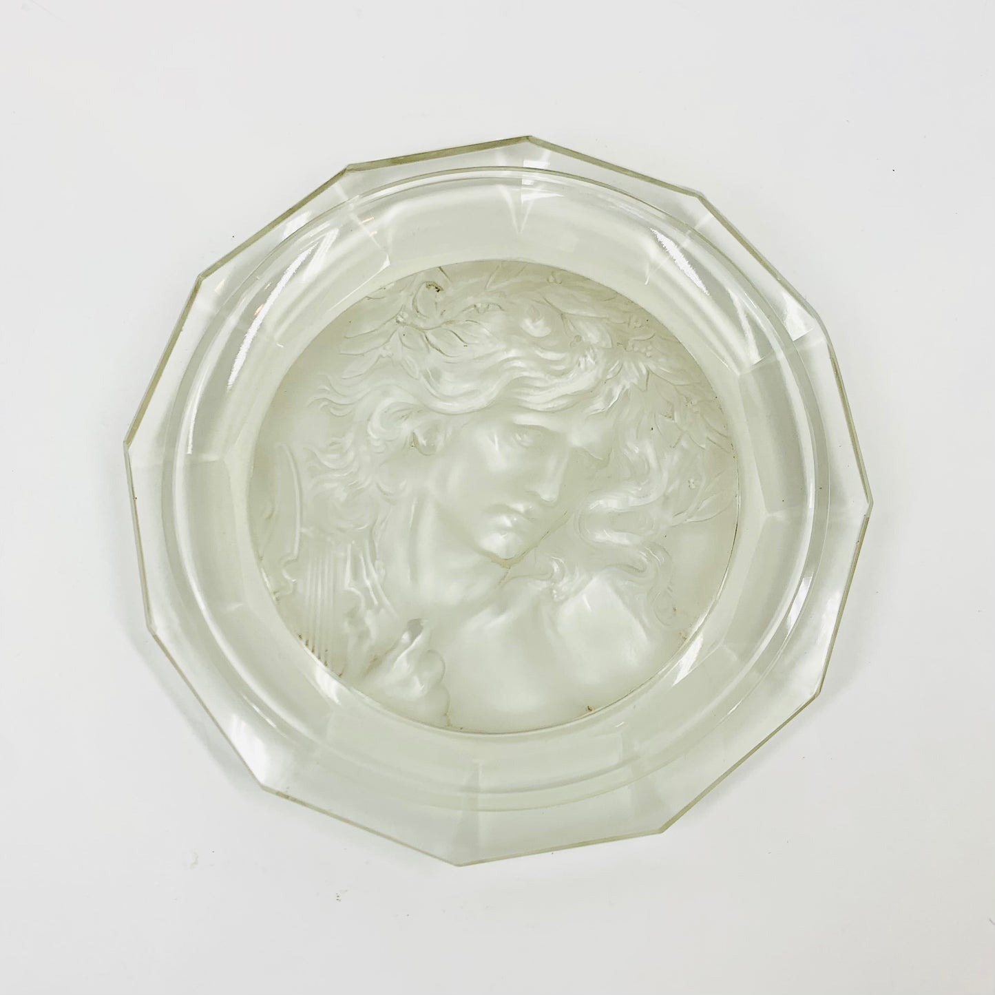 Rare antique pressed glass plate with the God Apollo relief