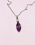 Antique sterling silver drop pendant necklace with purple glass paste