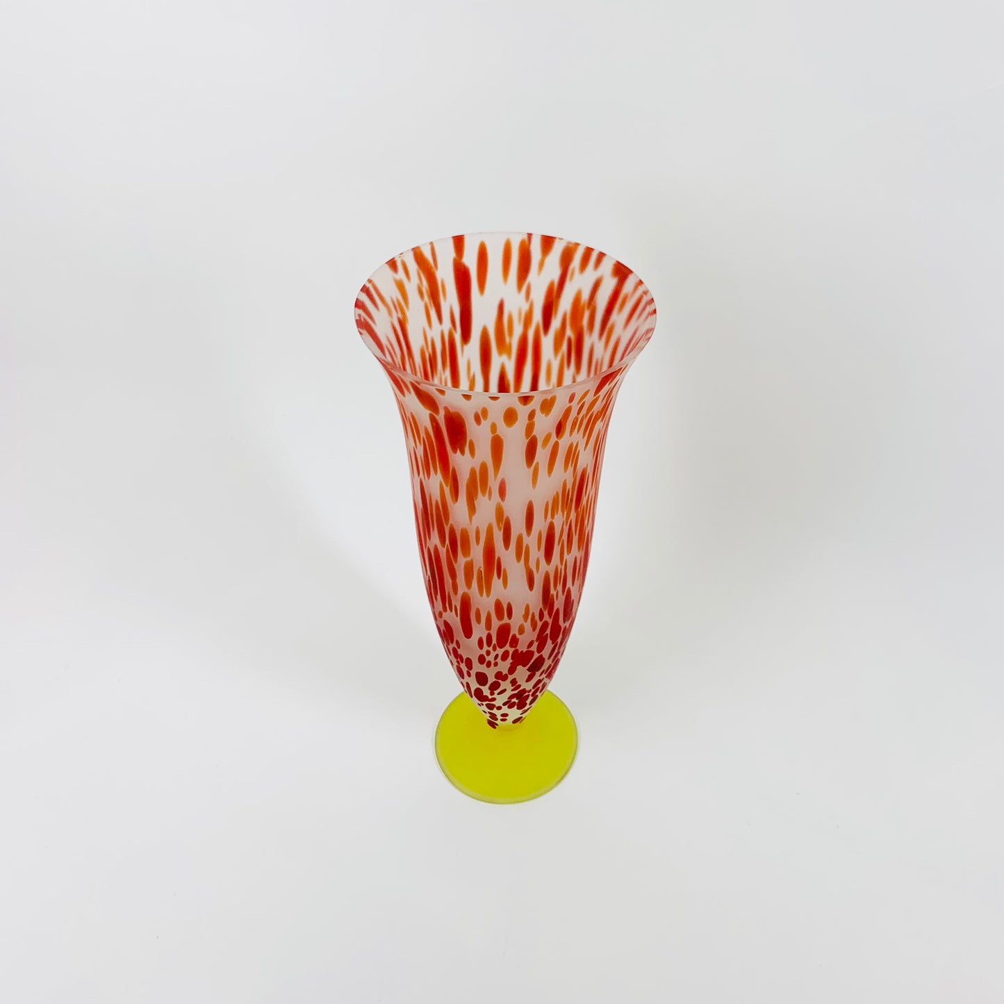 Stunning vintage red speckle satin glass yellow footed vase