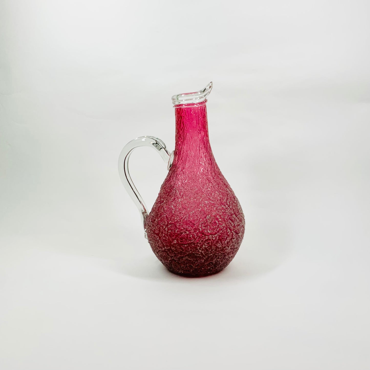 Antique Victorian cranberry crackle glass jug with clear handle