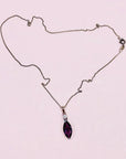 Antique sterling silver drop pendant necklace with purple glass paste