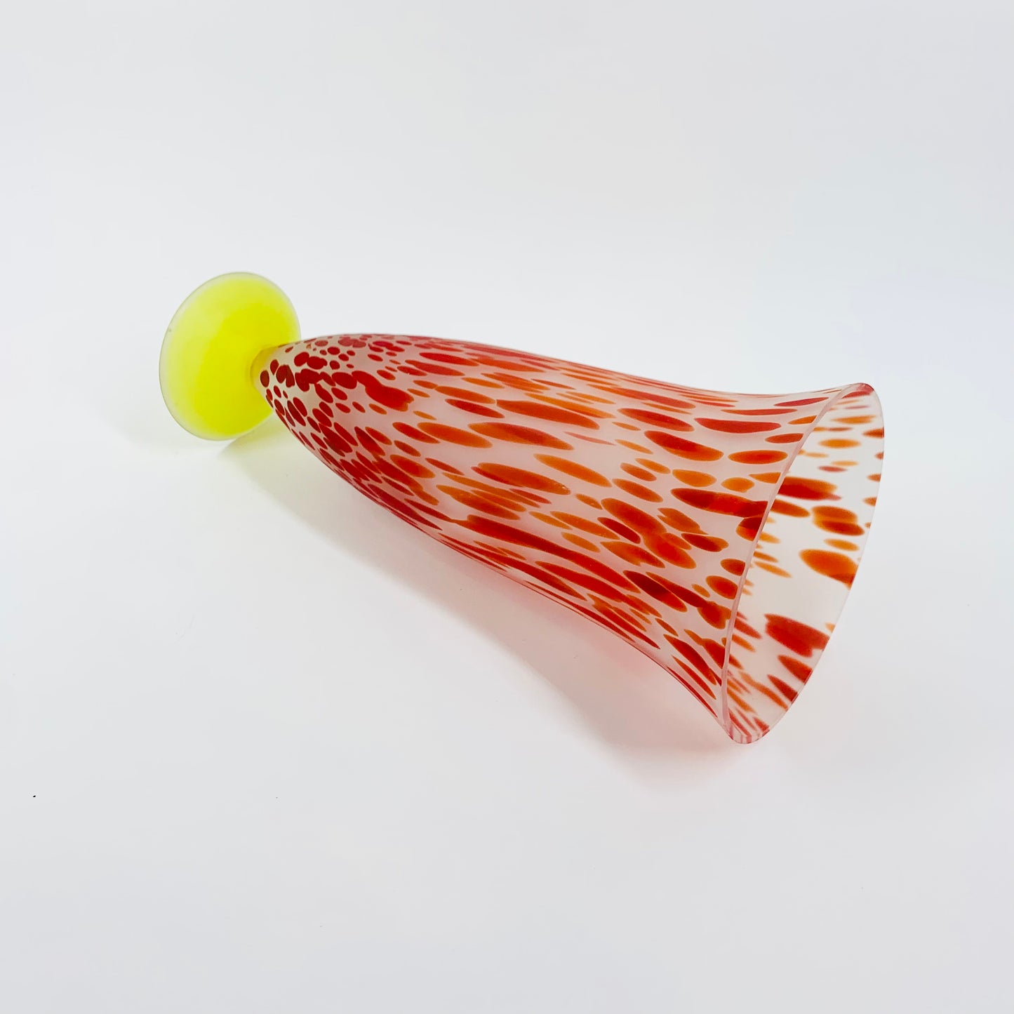 Stunning vintage red speckle satin glass yellow footed vase